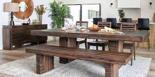 In the sitting space, get a vibrant carpet and place a round glass table in the middle, with furniture around. Country Rustic Dining Room With Teagan Extension Dining Table Living Spaces