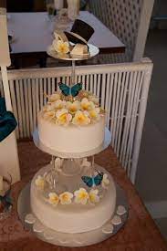 Frangipani Wedding Cake With Wine Glasses Storing Cake Cake Show Small Wedding Cakes