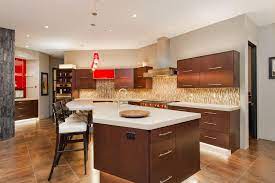 The backsplash and counter surrounding the sink are gorgeous, white marble. 20 Sensible Brown Kitchen Ideas