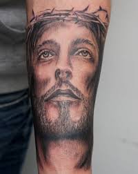 The majority of the portraiture jesus tattoos is placed on the shoulder and is inked in shades of black. 30 Holy Jesus Tattoos