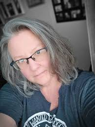 What hairstyle recommendations are suitable for a 52-year-old woman?