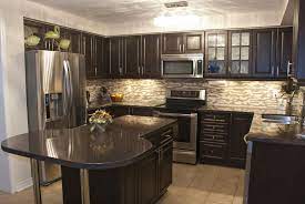 Can you lighten dark cabinets? 52 Dark Kitchens With Dark Wood Or Black Kitchen Cabinets Y Dark Brown Kitchen Cabinets Brown Kitchen Cabinets Backsplash With Dark Cabinets