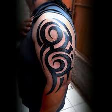 Tribal tattoo meanings, designs and ideas with great images for 2021. 75 Tribal Arm Tattoos For Men Interwoven Line Design Ideas