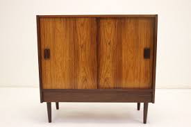 We did not find results for: Rosewood Veneer Sliding Door Cabinet Or Chest Of Drawers 1966 For Sale At Pamono