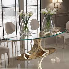 If you love to entertain and love a chic, contemporary finish, these styles may be just what you need to add the right kind of pop to your home. Designer 24 Carat Gold Plated Oval Glass Dining Table Juliettes Interiors