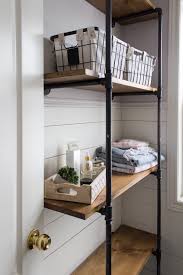 Wall shelves turn empty walls into a great place to store and show off your things. Build To Organize Challenge Diy Pipe Shelves For The Bathroom House By The Bay Design