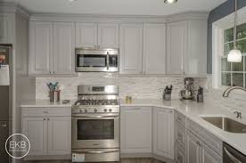 Waypoint 660r Cabinets In Painted Stone And Stellar Snow Silestone Countertops Kitchen Design Silestone Countertops Silestone Kitchen