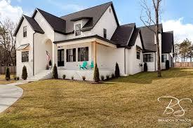 Black And White Brick Paint White Painted Brick And Black Roof Black Windows With Black Soffit And Fascia Make This East Side F Brick Exterior House White Exterior Houses Brick Farmhouse
