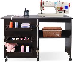 Shopping for the best desk for sewing machine should not be such a daunting task. Amazon Com Folding Sewing Table Multifunctional Sewing Machine Cart Table Sewing Craft Cabinet Table With Storage Shelves Portable Rolling Sewing Desk Computer Desk With Lockable Casters Brown Kitchen Dining