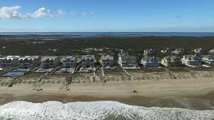 Enjoy this live outer banks webcam located at corolla light resort in north carolina as it pans the beautiful beach. Corolla Light In Corolla North Carolina