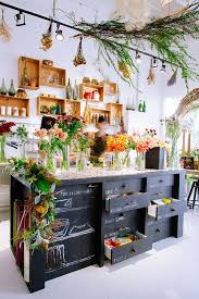 16 Inspiring Ideas For Organizing Your Craft Room Flower Shop Interiors Shop Interiors Bohemian Style Kitchen