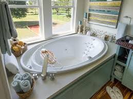 These 22 soaking tubs are so gorgeous you'll start to relax just looking at them. The 6 Foot Infinity Soaking Tub Is Outfitted With Chromotherapy Lights Six Hydromassage Jets And 10 Back Jets Bathtub Decor Master Bathroom Jetted Bath Tubs
