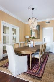 Eclectic Transitional Dining Room With Accent End Chairs And Layer Rug Interior Design By Designstiles Transitional Dining Room Layered Rugs Home Decor