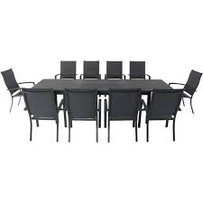 At macys.com an 11 piece vintage outdoor patio furniture dining set has one 90x 60 rectangular table, 6 dining chairs and 4 swivel chairs, so 10 chairs total. Hanover Dawson 11 Piece Aluminum Outdoor Dining Set With 10 Padded Sling Chairs And An Expandable 40 In X 118 In Table Dawdn11pchb Gry The Home Depot