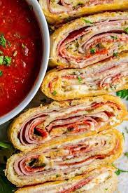 Stromboli Is Basically Rolled Up Pizza With Mozzarella Ham And Salami I Threw In Some Pepperoni And Pepper Ja Stromboli Recipe Easy Stromboli Recipe Recipes