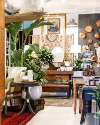 Oliver And Rust Fall 2019 Vintage Plant Shop Display Vintage Turkish Rug On Antique Workbench Decor Shop Decoration Vintage Decor