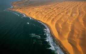 It is located 70 km north of swakopmund and is an important holiday settlement. Hd Wallpaper Aerial View Beach Coast Desert Dune Landscape Namibia Wallpaper Flare