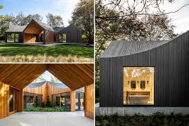 Kwp engineered wood siding delivers the curb appeal, authenticity and warmth of traditional wood siding but with a modern twist. Deep Gray Slatted Accoya Wood Siding Covers The Exterior Of This Modern House