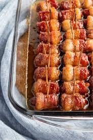 Just wrap them in bacon, and place them in a slow cooker. Brown Sugar Bacon Wrapped Little Smokies Bread Booze Bacon