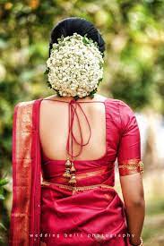 Pin By Sree Lakshmi On Gajara Hair Bun South Indian Bride Hairstyle Bridal Hairstyle Indian Wedding Wedding Saree Blouse Designs