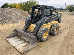 This particular machine has a hydraulic bucket coupler which is very handy especially with the cabin enclosure. 1995 New Holland L 865 Skid Steer Bigiron Auctions