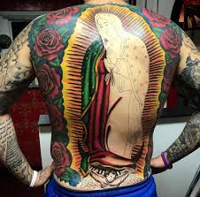 The basilica of the virgen de guadalupe was built in the same place that she appeared to juan diego, and on december 12 you don't have to search too long on google images to see different variations of la virgen, so we thought we would focus on one very popular method of honoring her: S A Man S Giant Virgen De Guadalupe Tattoo Took Months Over 4 000 To Complete