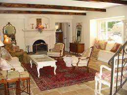 A wooden piece of furniture equipped with a chest, armrests and back rested during the italian renaissance. Custom Home Remodel French Country Living Room Mediterran Wohnbereich Los Angeles Von Barbara Stock Interior Design Houzz