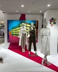 jelmoli department store shopping mall seidengasse zurich switzerland we re open again one careful step at a tim visual merchandising we re open coat