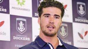 Fremantle defender Alex Pearce re-injures leg he broke