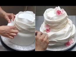 If you've ever slaved over decorating a cake with fondant, you know how disappointing it is to watch people peel it off and only eat the cake. Ruffle Cake How To Make A Beautiful And Easy Fondant Ruffle Cake Tuto Cake Decorating Ruffle Wedding Cake Fondant Ruffles