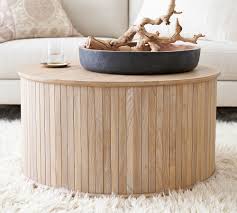 Perhaps you're looking for one that provides extra storage space for blankets. Buy Arlo 31 Tambour Round Storage Coffee Table Online Pottery Barn Uae