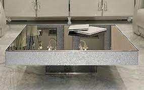 This statement metal and glass coffee table will add a touch of luxury to any home. Luxury Coffee Tables Sculptural Coffee Table Design Taylor Llorente Furniture