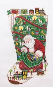 Model stitched one over two on 18 ct. Rebecca Wood Trains For Christmas Stocking Needle Nook Needlepoint Christmas Stockings Christmas Stockings Needlepoint Christmas