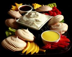 Using a spoon, dot the cream with passionfruit pulp. Pavlova Dessert Charcuterie Board Celebration Generation