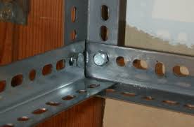 Organizing the garage with diy pegboard storage wall. Overhead Garage Shelves Using Slotted Angle Iron David Frink