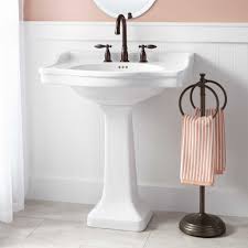 Add more storage to small bathrooms or bathrooms with pedestal sinks by hanging spice racks. Bathroom Pedestal Sink Layjao