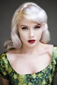 Very Effective With That Platinum Blond Hair Pale Skin Blue Eyes And Red Lips And That Green Dre Blonde Hair Pale Skin Pale Skin Hair Color Hair Pale Skin
