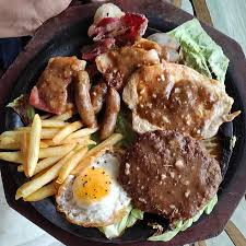 Depending how thick the hamburger my recipe uses a cup of rice, you will have some leftover, but rice freezes well. Trincas Special Mixed Grill Sizzler Mutton Hamburger Steak Chicken Steak Pork Sausages Bacon Fried Egg And French Fries With A Rosemary Mushroom Sauce Picture Of Trincas Restaurant And Bar Kolkata Calcutta