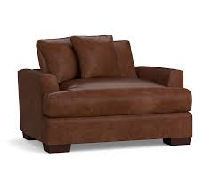 A chair and a half ottoman set is essentially a big chair. Sullivan Fin Arm Deep Seat Leather Chair And A Half Pottery Barn