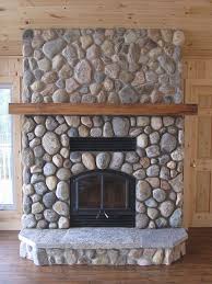 In this video, this old house plumbing and heating expert richard trethewey shows how to dramatically increase the heat output of a wood burning fireplace insert. Opel Wood Burning Fireplace With River Stone Efficient Wood Gas Wood Burning Fireplace Inserts Wood Burning Fireplace River Rock Fireplaces
