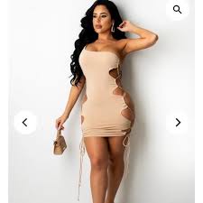 Nude mini dress Model is wearing small Model is... | Depop