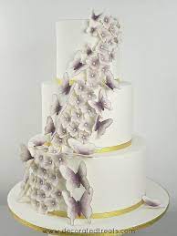 How to decorate your cakes like a pro. Butterflies Wedding Cake A Decorating Tutorial Decorated Treats