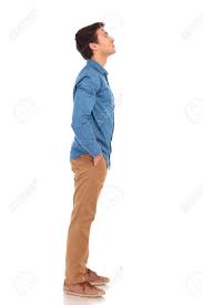 How does a standing instruction work? Side View Of A Casual Young Man Looking Up Standing With Hands Stock Photo Picture And Royalty Free Image Image 77779766