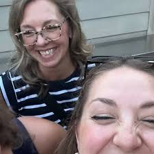 A mother is facing backlash for wearing a robe and a towel wrapped around  her head to drop off her kids at school. Is this right?