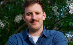 Pious Ali Challenges Jon Hinck