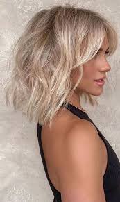 Short straight bob with bangs. Cute Summer Hair Color Ideas 2021 Vanilla Blonde Bob With Curtain Bangs