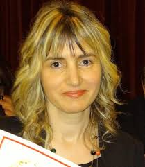 Irma Kurti è una poetessa, scrittrice, paroliera, giornalista e traduttrice  albanese naturalizzata italiana