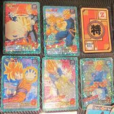 It is produced by score entertainment, and uses screen captures of the dragon ball z and dragon ball gt animes to attempt to recreate the famous events and battles seen in the show. Super Rare Lot Dragon Ball Z Cards Japan French Spanish 1844717156