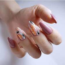 Create almond shaped nails at home by filing the sides of your nail towards the centre and rounding off the tip. Almond Matte White And Gold Nails Matte