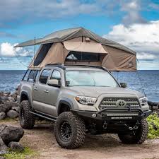 The Tuff Stuff Rooftop Tent Is Designed To Provide The Ultimate Comfort Ease And Convenience When Traveling To Truck Canopy Camping Tacoma Truck Truck Canopy